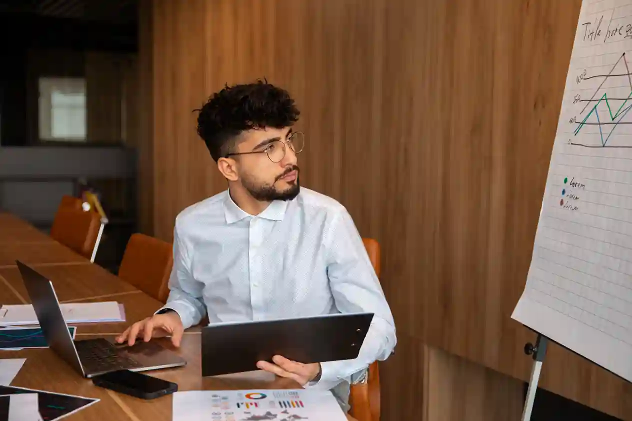 Primary data collection setup with questionnaires, notes, and digital recording devices