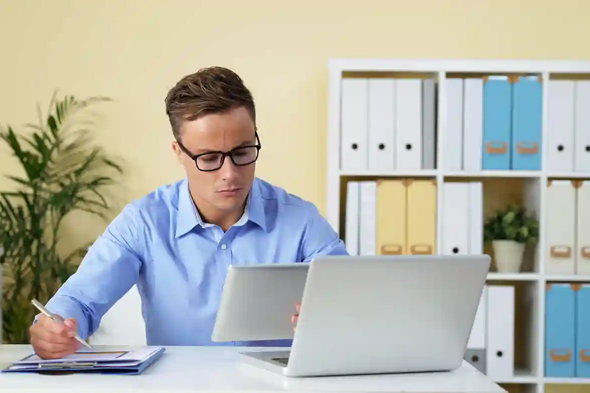 Analyst gathering field data through structured surveys for primary data collection