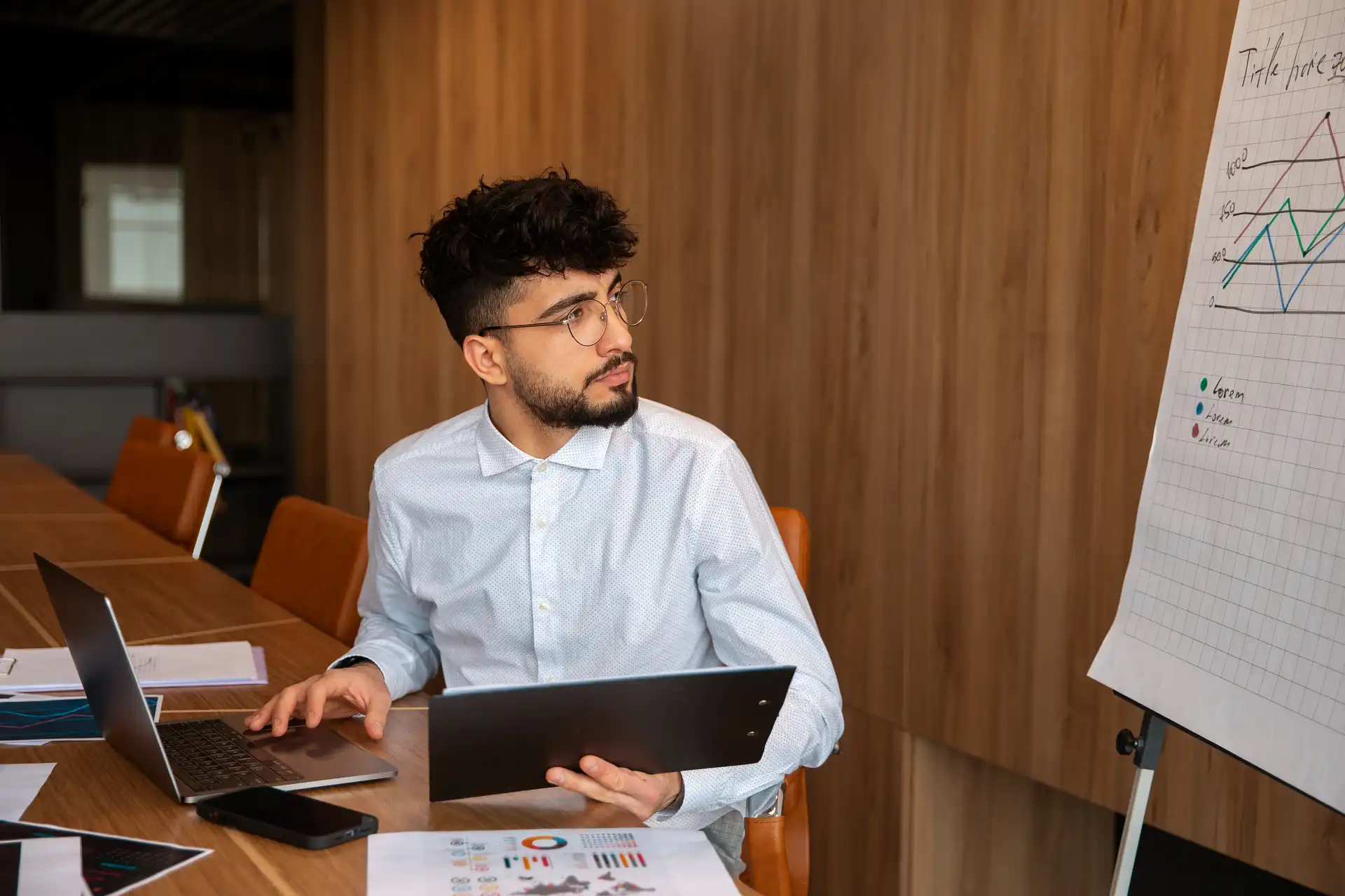 Analyst examining online archives and organizational records during the secondary data collection process.