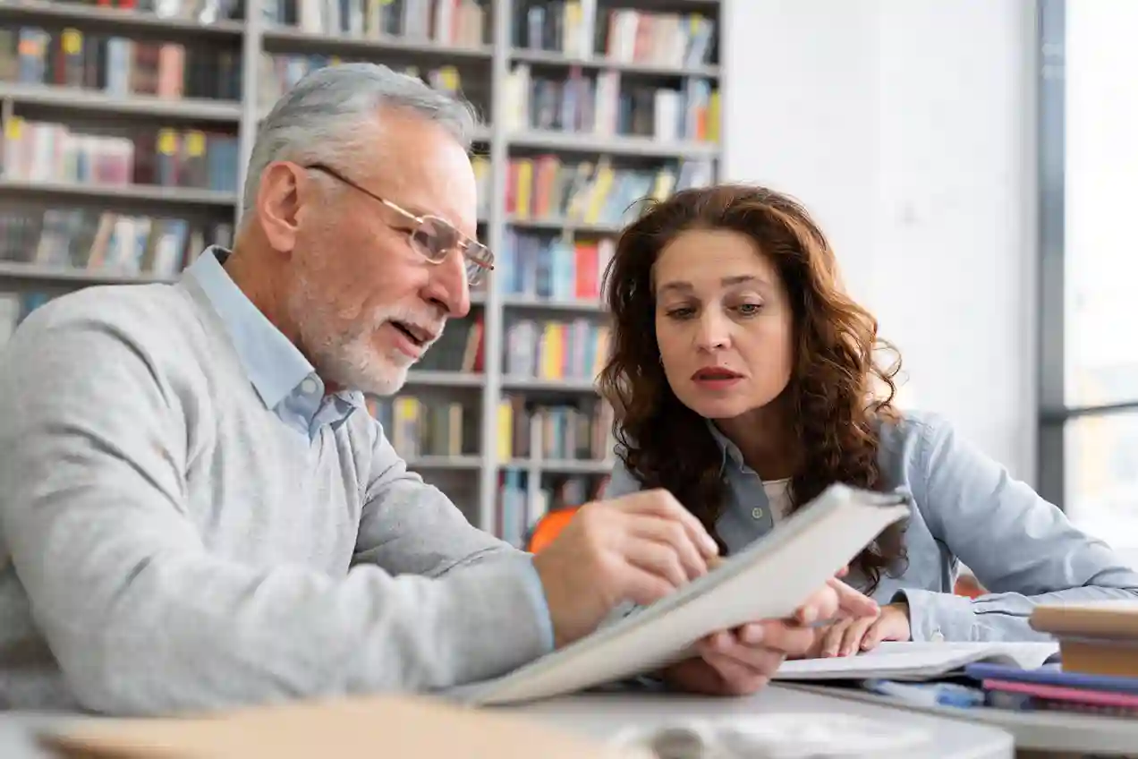 Academic mentor assisting student with thesis structuring as part of dissertation help writing support.